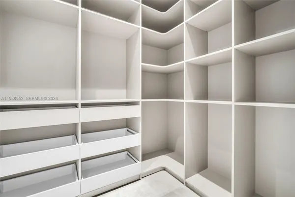 a view of an empty walk in closet