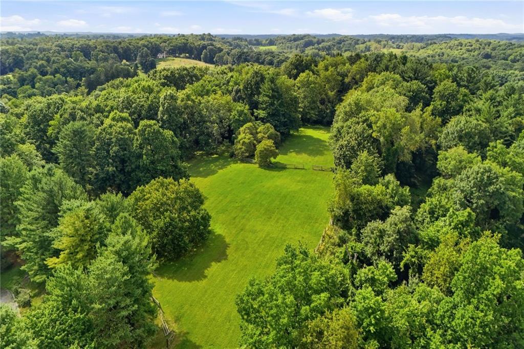 45 Stonedale Road Sewickley, PA 15143 - Photo 2 of 26 Gently rolling land surrounded by mature woods.