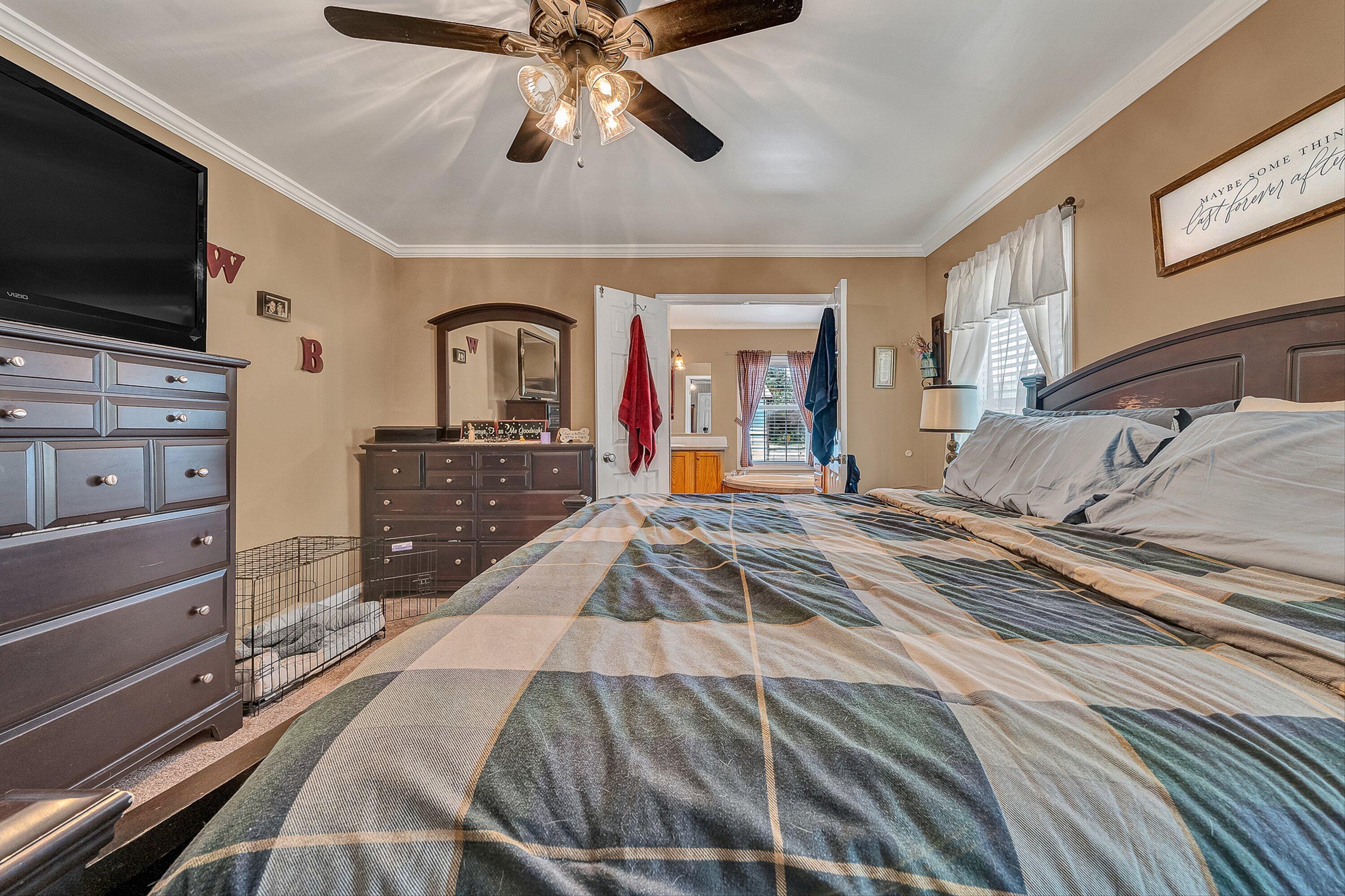 159 Simmons Creek Road Union Hall, VA 24176 - Photo 20 of 55 a bedroom with a bed and a flat screen tv