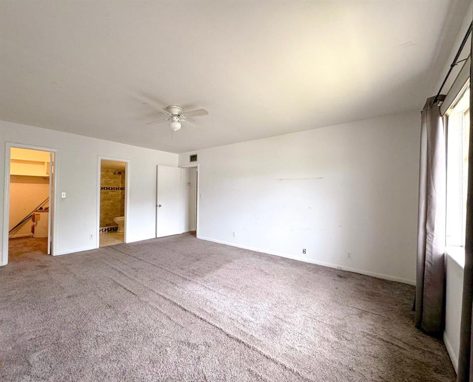 12 Northeast 19th Court, Unit 204A Wilton Manors, FL 33305 - Photo 8 of 21 a view of an empty room with a window