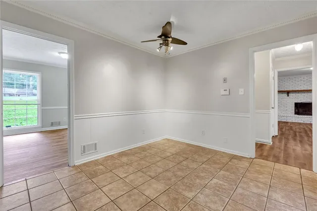 a view of an empty room and window