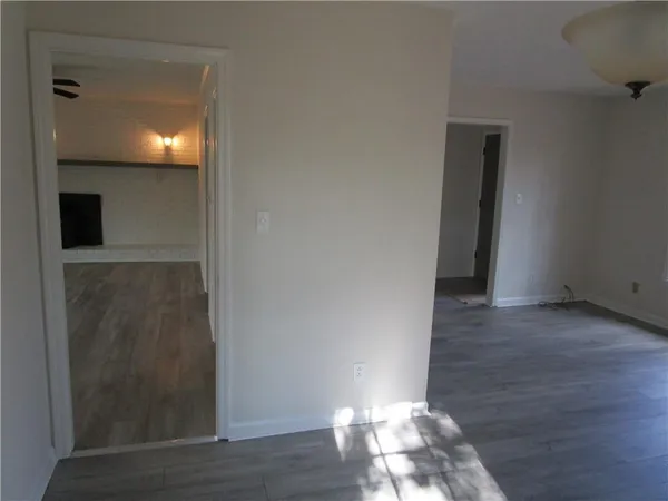 a view of a livingroom with wooden floor