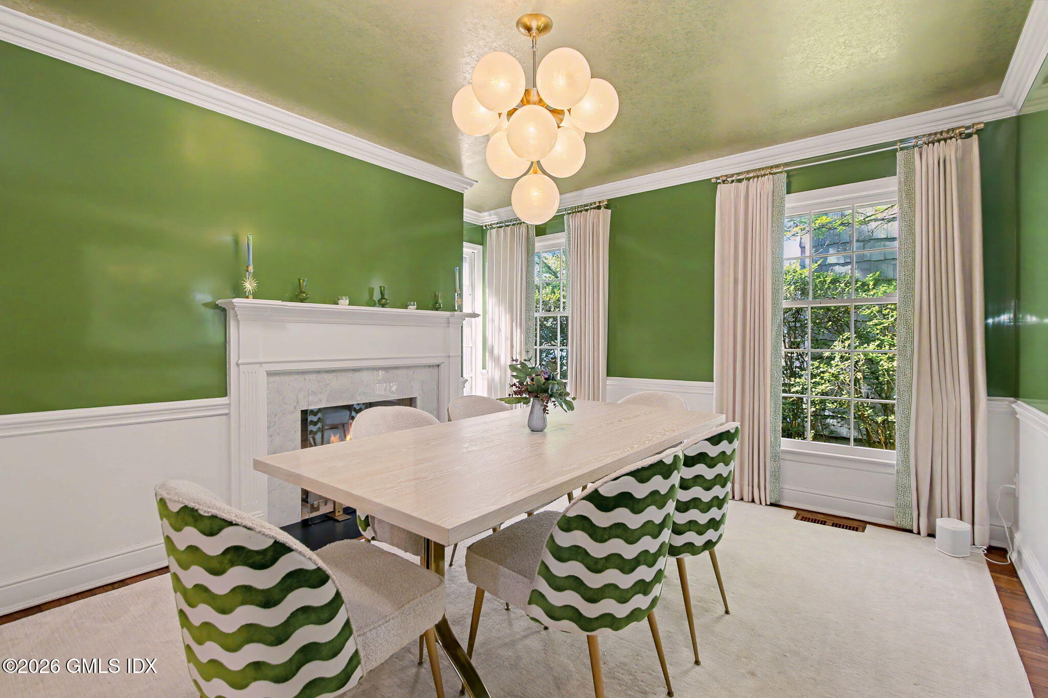 10 Newton Street Riverside, CT 06878 - Photo 6 of 28 a view of a dining room with furniture wooden floor and chandelier