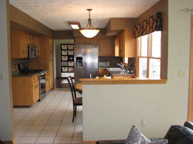 2946 Lark Rise Rockford, IL 61114 - Photo 8 of 17 a view of a dining room with furniture window and wooden floor