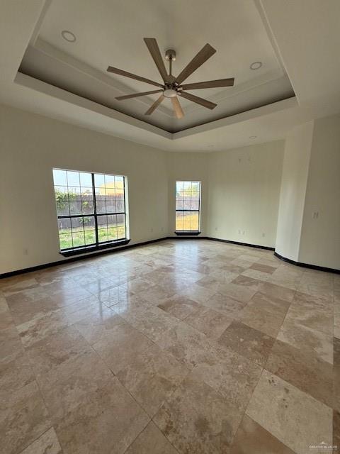7610 Wagon Trail Drive Mission, TX 78572 - Photo 16 of 43 an empty room with windows and ceiling fan