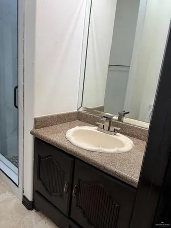 a sink and a mirror