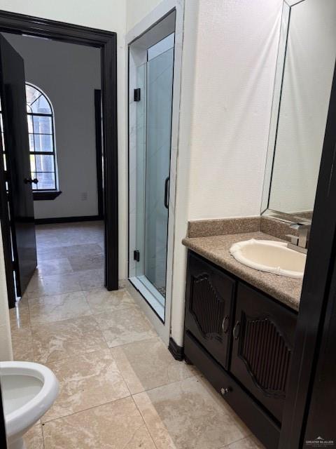 7610 Wagon Trail Drive Mission, TX 78572 - Photo 28 of 43 a bathroom with a sink a toilet and a mirror