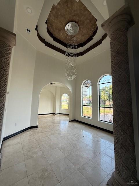 7610 Wagon Trail Drive Mission, TX 78572 - Photo 38 of 43 a view of an empty room with a fireplace and a chandelier