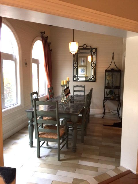 394 Mallard Point Jupiter, FL 33458 - Photo 5 of 16 a view of a dining room with furniture and a chandelier