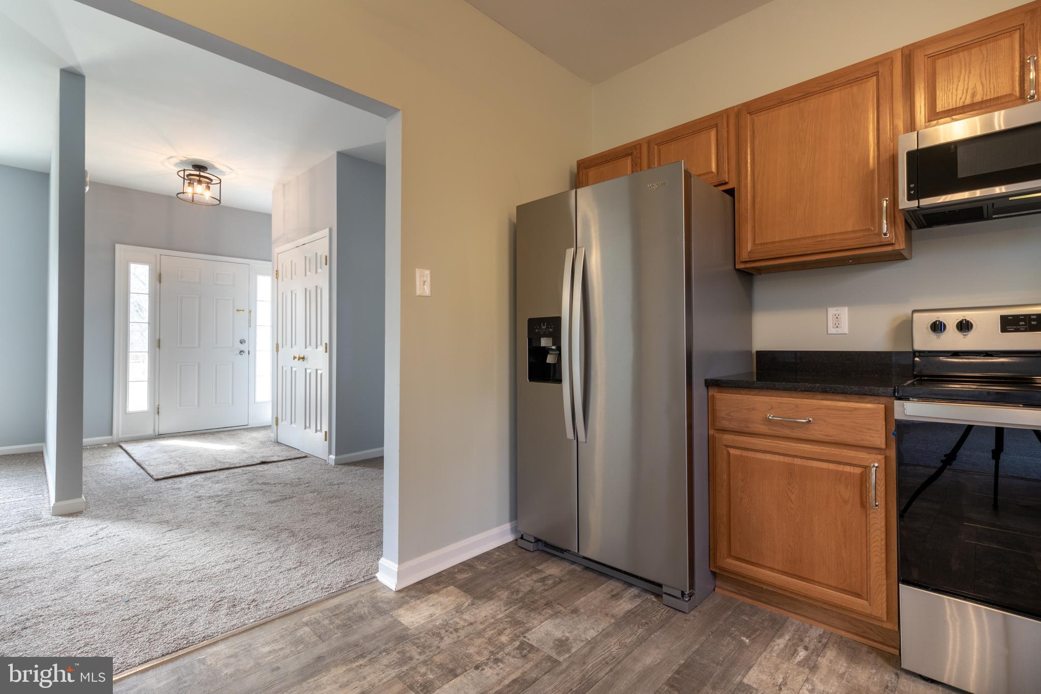 12206 Brandywine Road Brandywine, MD 20613 - Photo 12 of 62 through kitchen to foyer