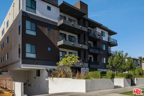 a front view of a house with outdoor space