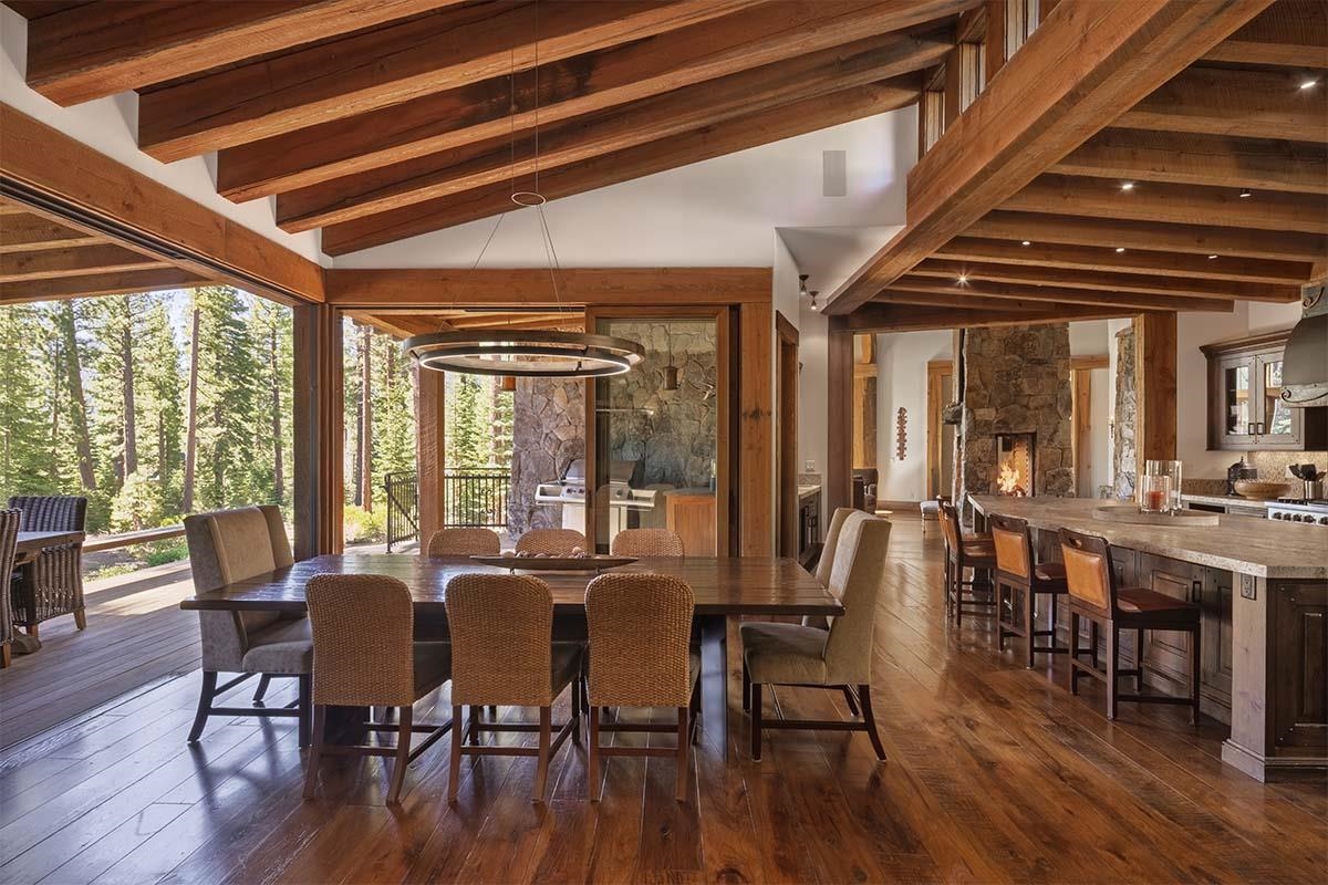 8186 Valhalla Drive Truckee, CA 96161 - Photo 11 of 28 a view of a dining room with furniture window and wooden floor