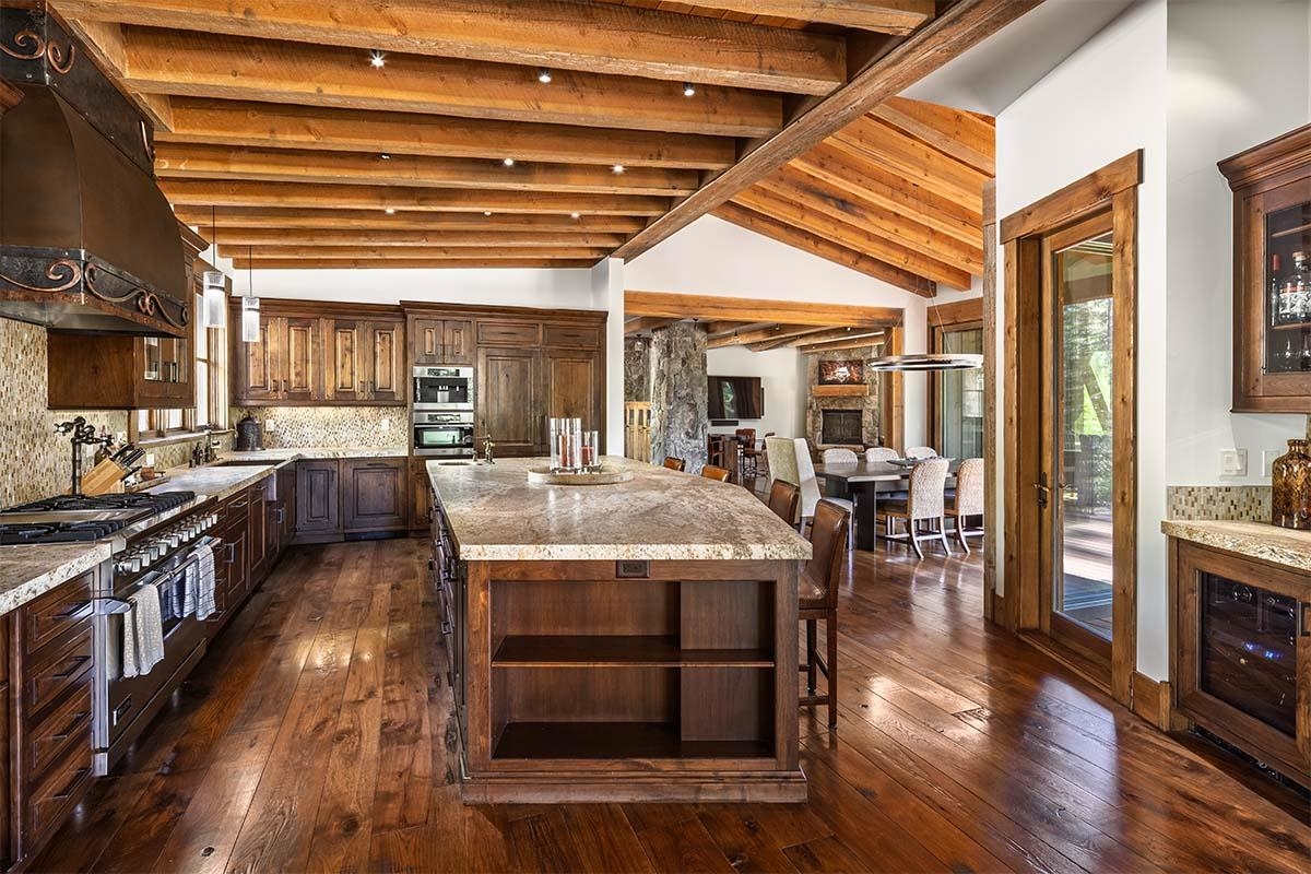 8186 Valhalla Drive Truckee, CA 96161 - Photo 13 of 28 a kitchen with stainless steel appliances granite countertop a stove and cabinets
