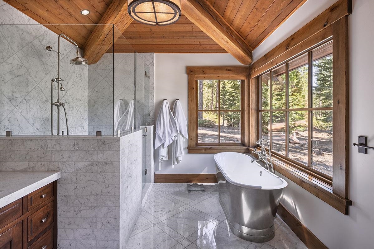 8186 Valhalla Drive Truckee, CA 96161 - Photo 18 of 28 a bathroom with a sink a toilet and a bathtub