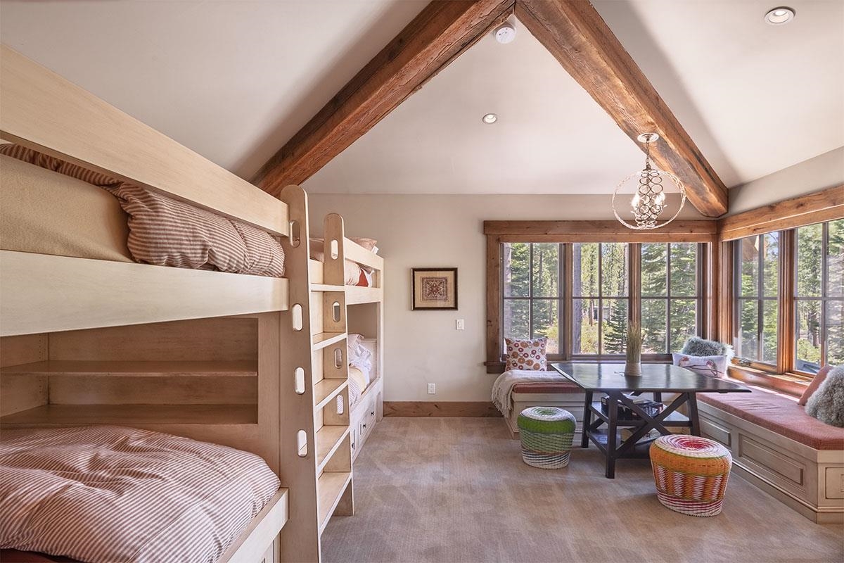 8186 Valhalla Drive Truckee, CA 96161 - Photo 23 of 28 a bedroom with furniture and a large window