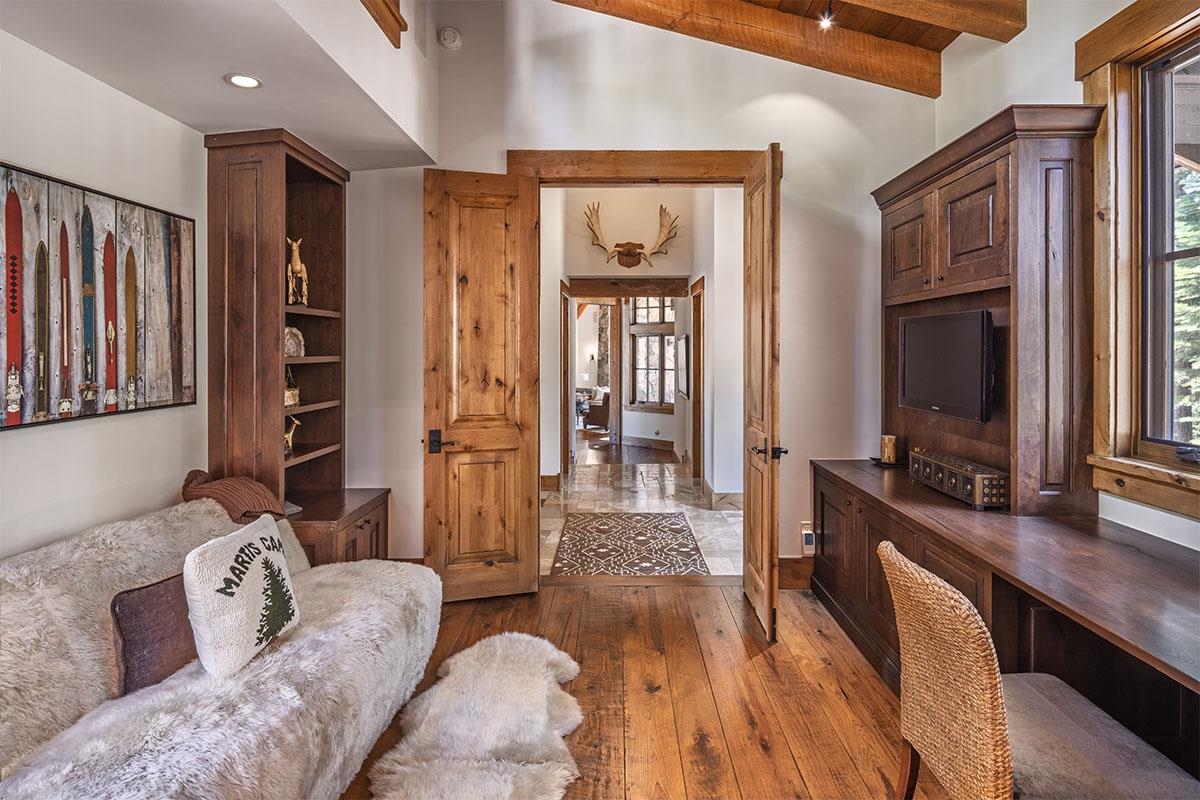 8186 Valhalla Drive Truckee, CA 96161 - Photo 26 of 28 a living room with furniture and a flat screen tv