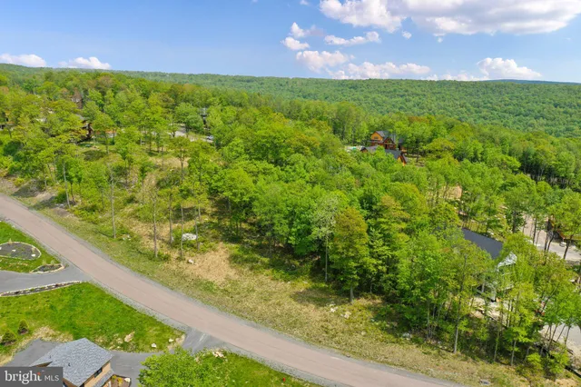 a view of a yard with an outdoor space