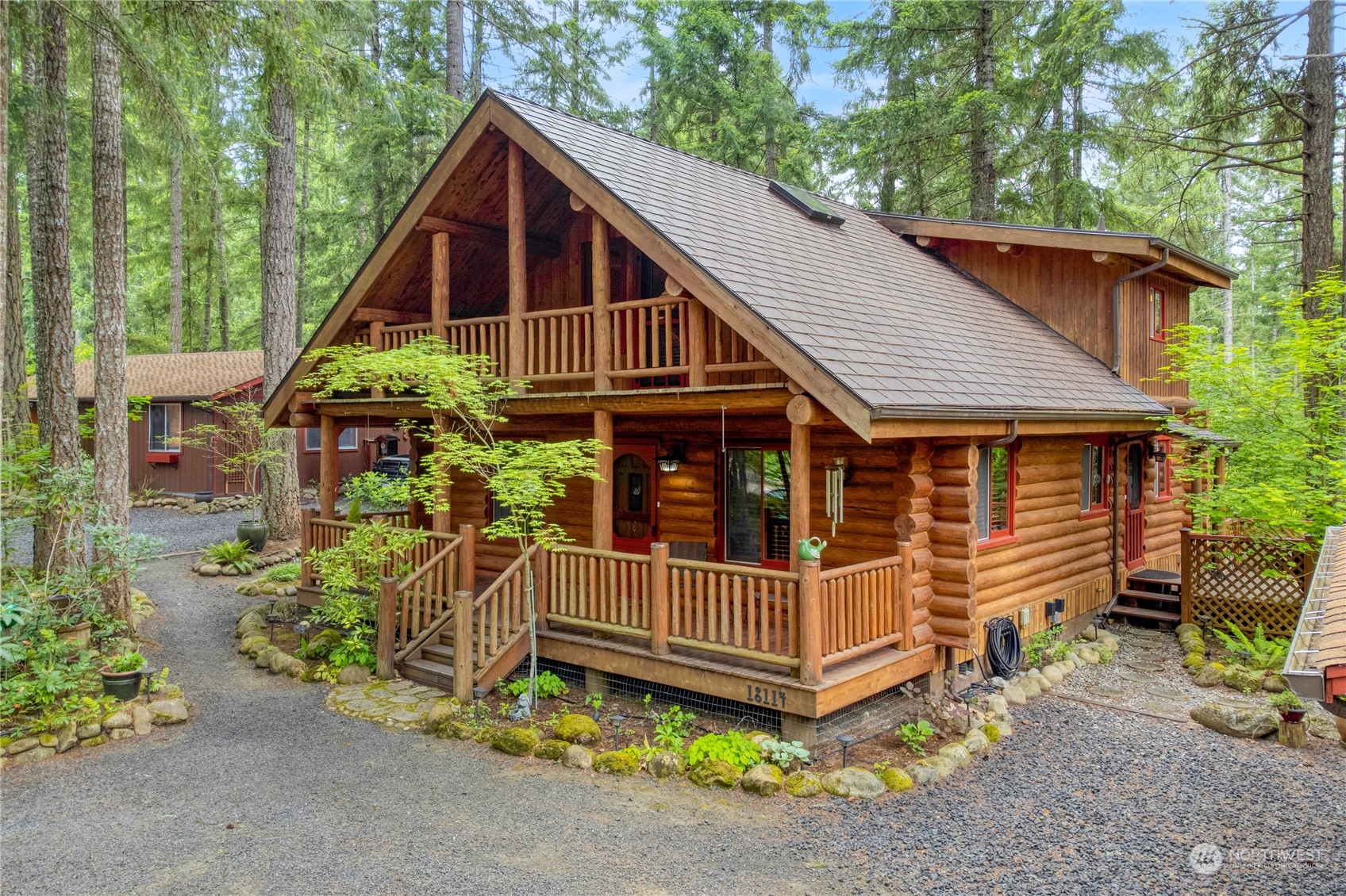 18114 Rampart Drive Southeast Yelm, WA 98597 - Photo 1 of 38 a view of a house with a small yard and wooden fence