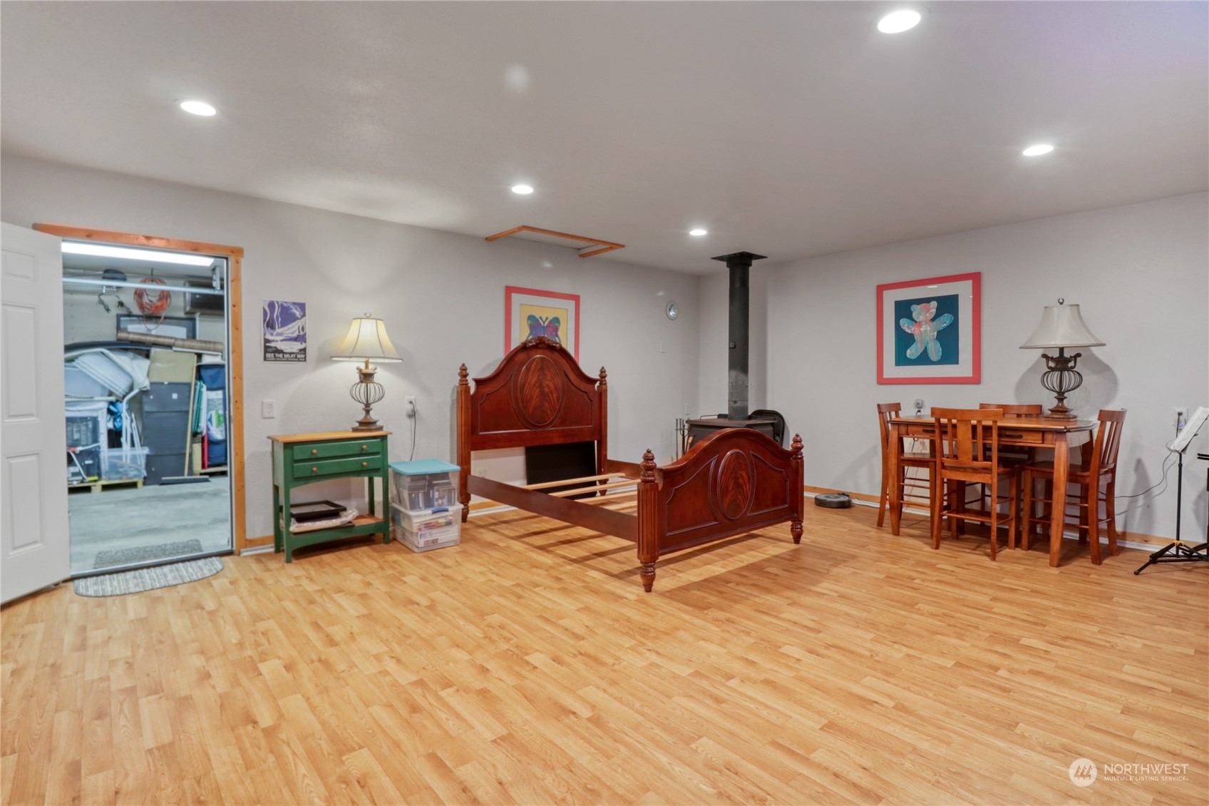 18114 Rampart Drive Southeast Yelm, WA 98597 - Photo 29 of 38 a living room with furniture and a flat screen tv