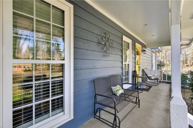 a view of sitting area with glass door and glass door