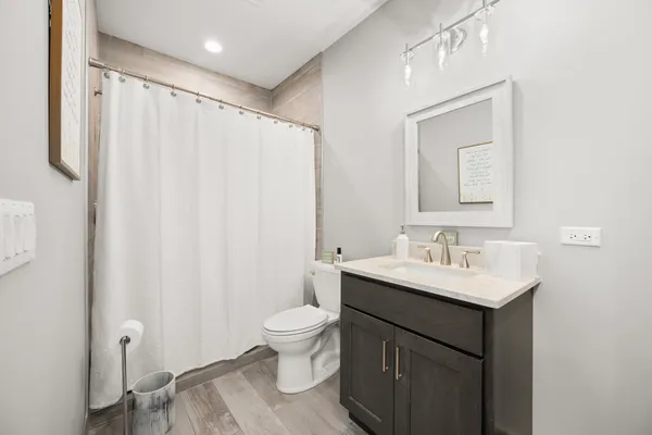 a view of a double vanity sink and mirror