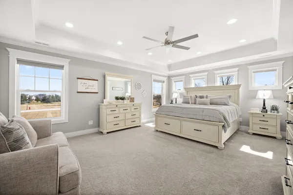 a bed room with a bed and a window
