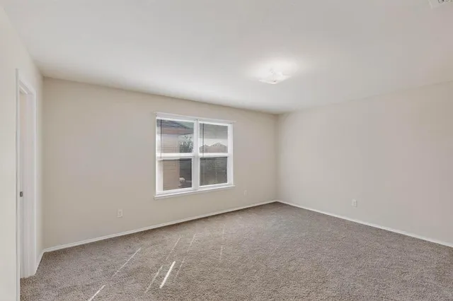 an empty room with a window