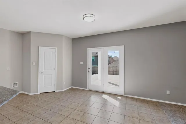 a view of an empty room with window