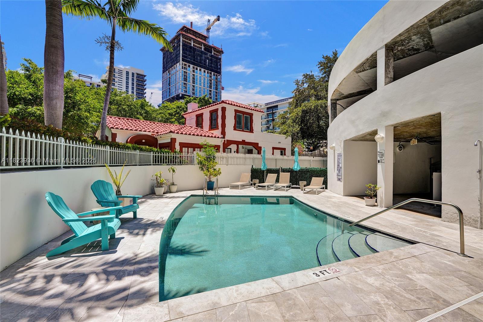 455 Northeast 25th Street, Unit 609 Miami, FL 33137 - Photo 20 of 27 a view of a house with swimming pool and sitting area