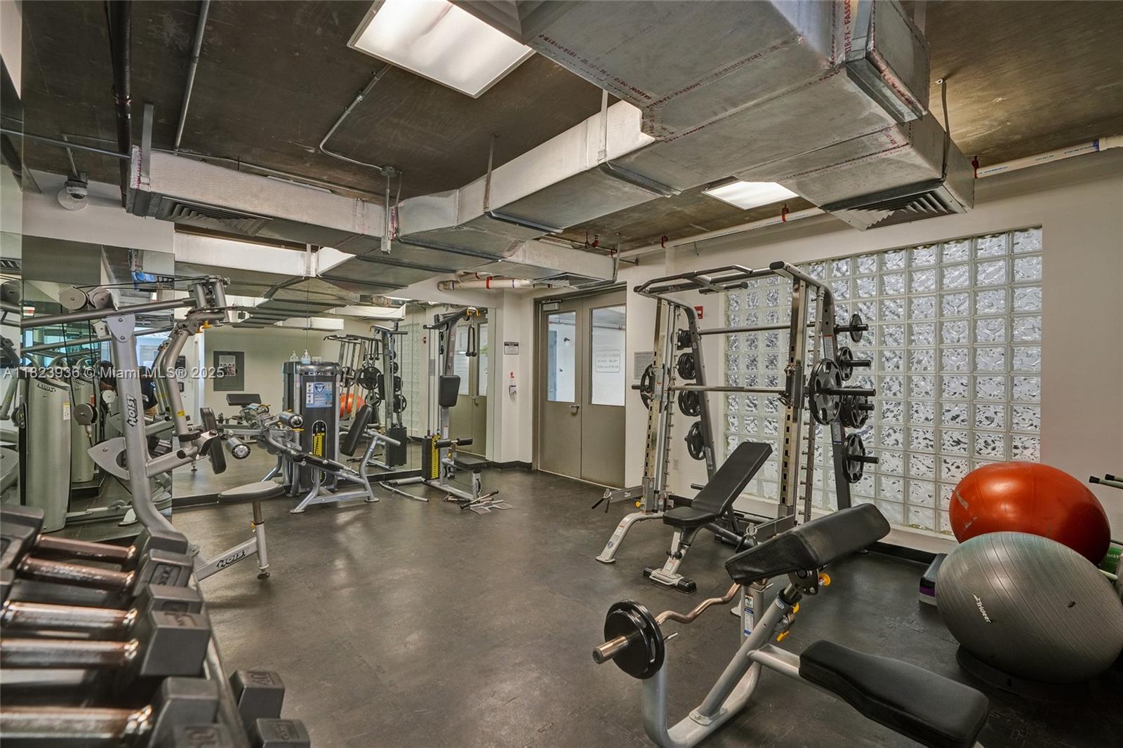 455 Northeast 25th Street, Unit 609 Miami, FL 33137 - Photo 26 of 27 a view of a room with gym equipment