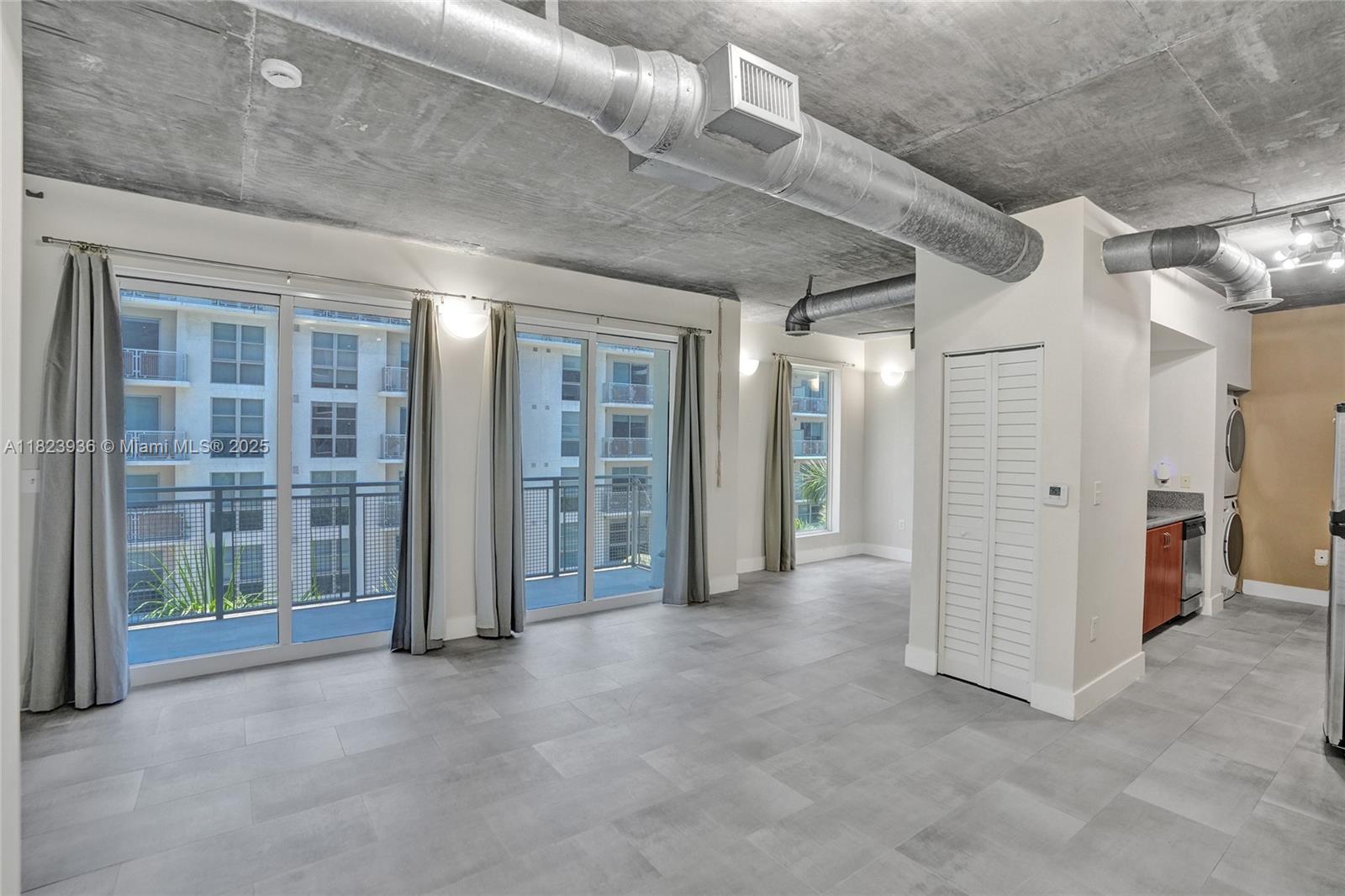 455 Northeast 25th Street, Unit 609 Miami, FL 33137 - Photo 5 of 27 a view of empty room with an entrance