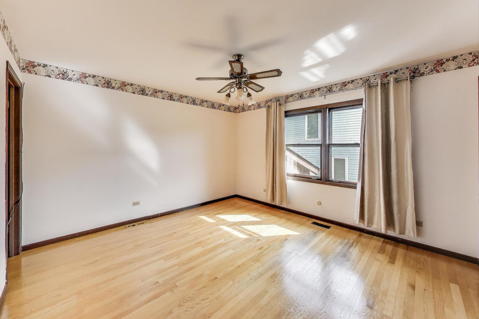 700 Noah Terrace Mount Prospect, IL 60056 - Photo 18 of 35 a view of an empty room with a window