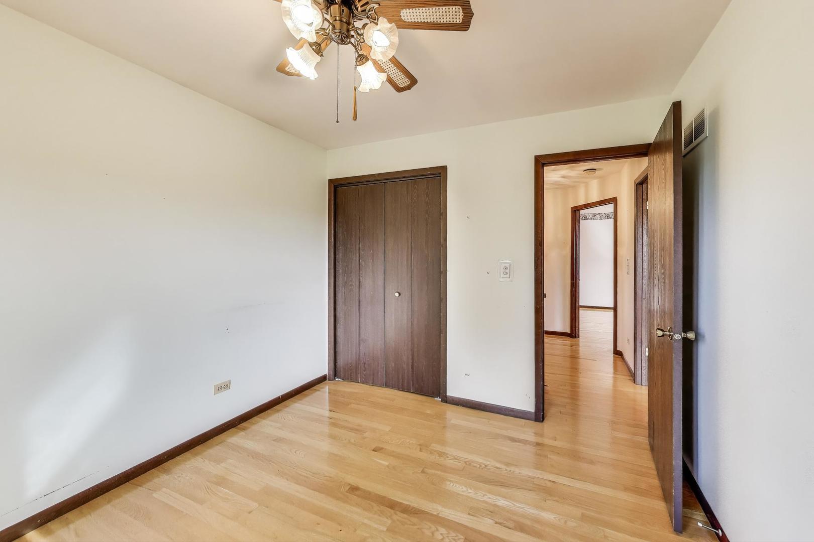 700 Noah Terrace Mount Prospect, IL 60056 - Photo 22 of 35 a view of empty room with wooden floor