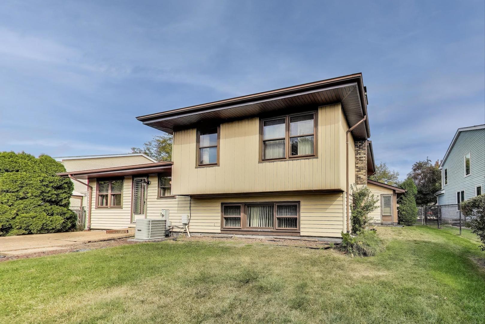 700 Noah Terrace Mount Prospect, IL 60056 - Photo 30 of 35 a house view with a outdoor space