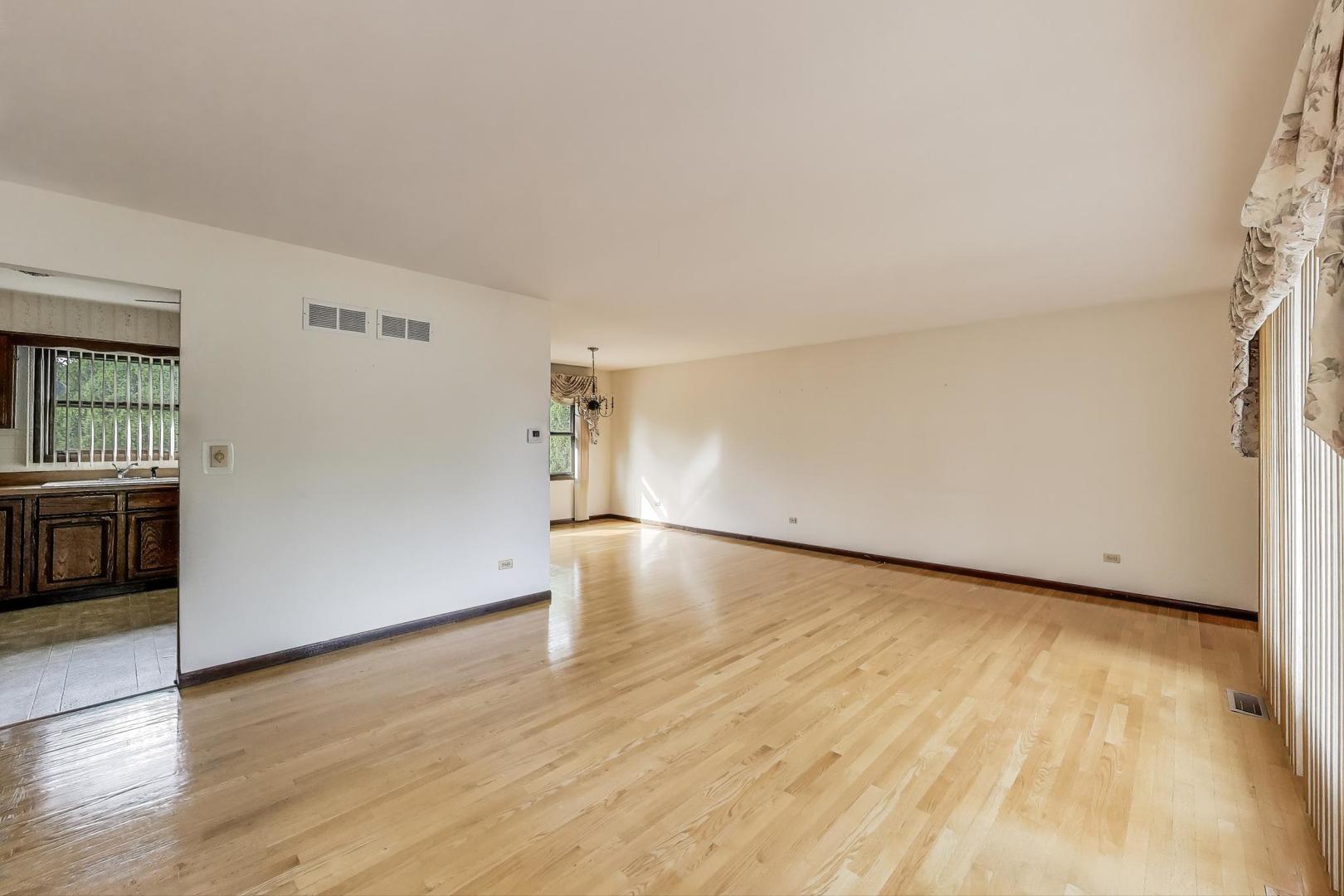 700 Noah Terrace Mount Prospect, IL 60056 - Photo 4 of 35 a view of empty room with wooden floor