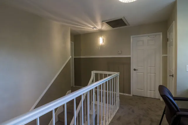 a view of entryway with stairs