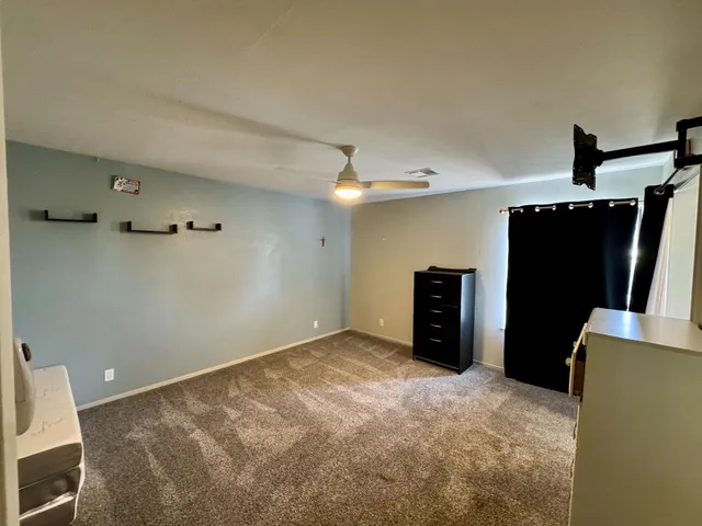 a view of a livingroom with furniture