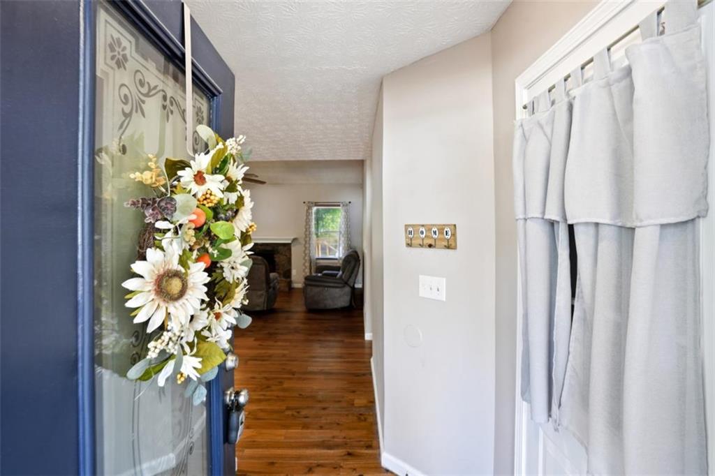15 Beaverdam Lane Covington, GA 30016 - Photo 3 of 24 a view of a entryway with wooden floor