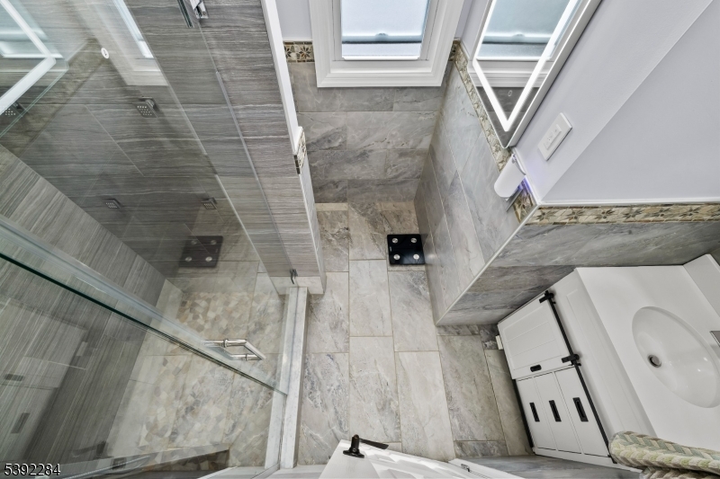 298 4th Avenue Hawthorne, NJ 07506 - Photo 16 of 26 a bathroom with a shower