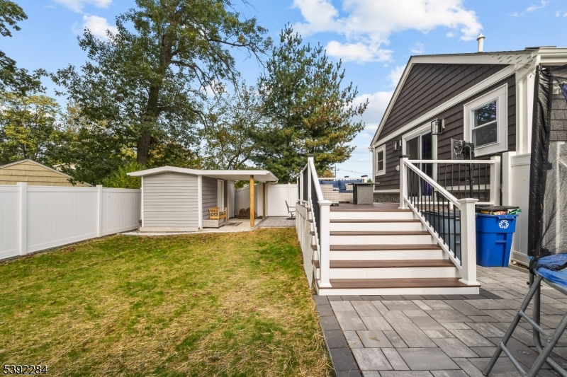 298 4th Avenue Hawthorne, NJ 07506 - Photo 5 of 26 a view of house with outdoor space and trees
