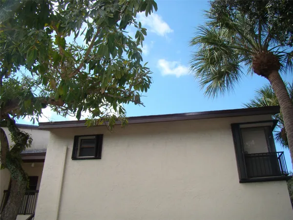 a kitchen with stainless steel appliances a stove a sink and a microwave