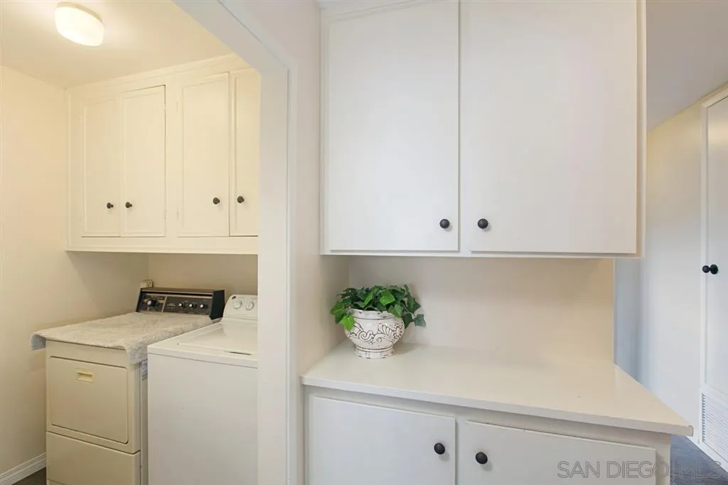 12928 Rios Road Poway, CA 92064 - Photo 13 of 24 a room with storage and utility