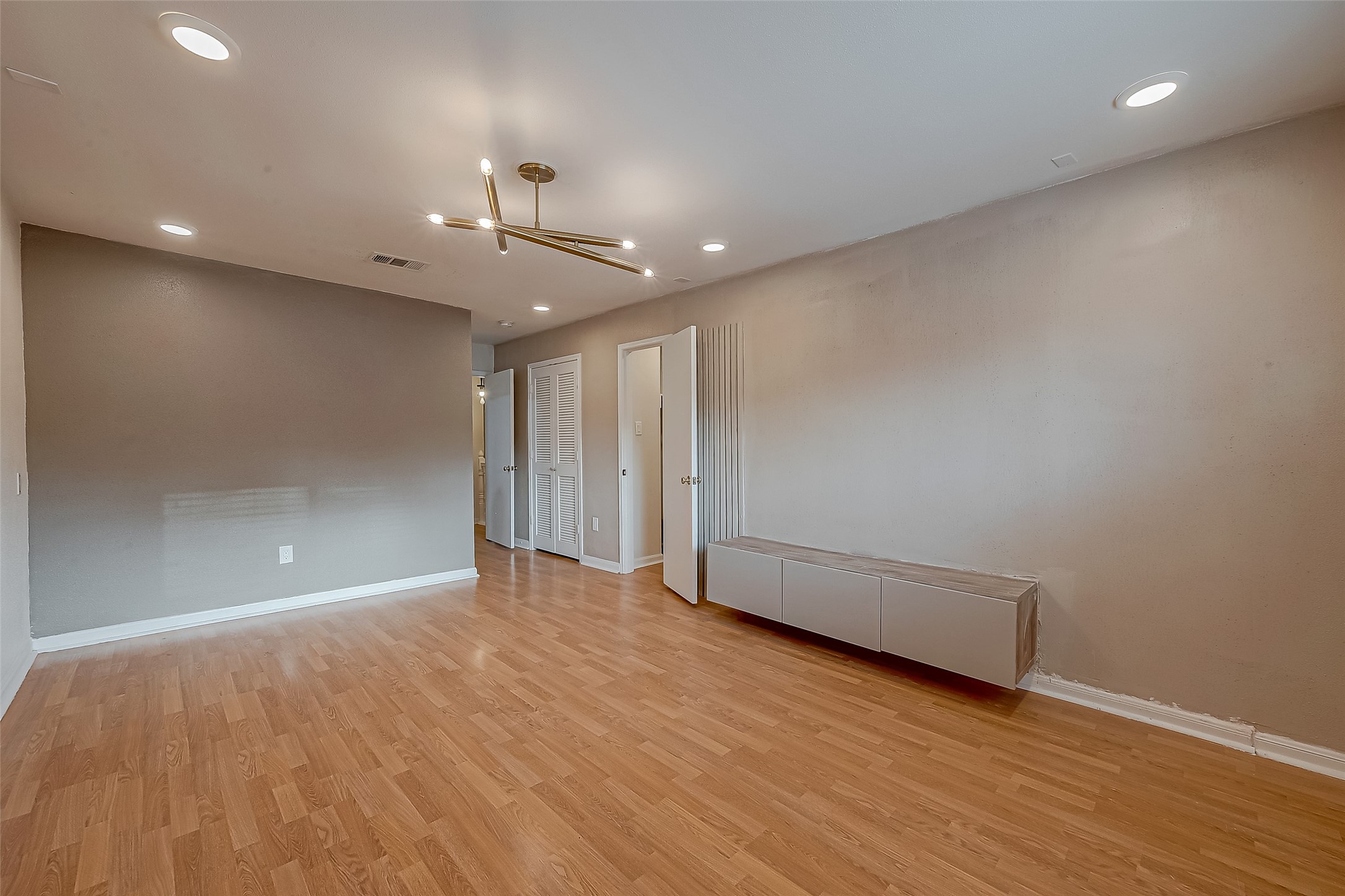 7497 Brompton Street, Unit 7497 Houston, TX 77025 - Photo 15 of 27 a view of an empty room