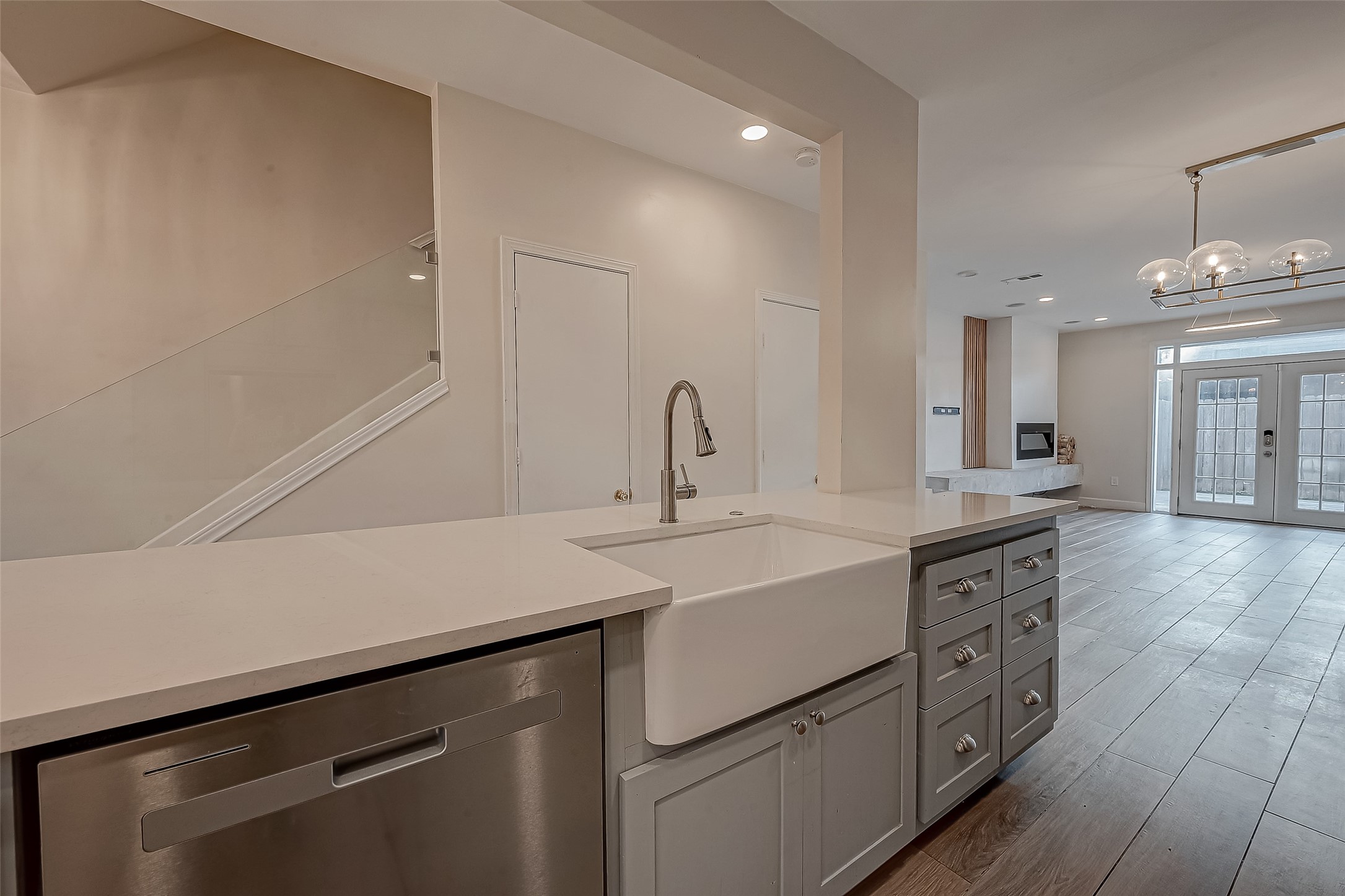 7497 Brompton Street, Unit 7497 Houston, TX 77025 - Photo 16 of 27 a kitchen with a sink and cabinets