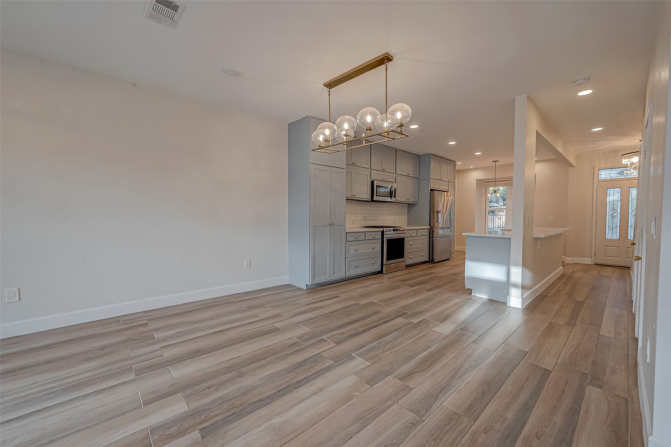 7497 Brompton Street, Unit 7497 Houston, TX 77025 - Photo 20 of 27 a view of a kitchen and a sink