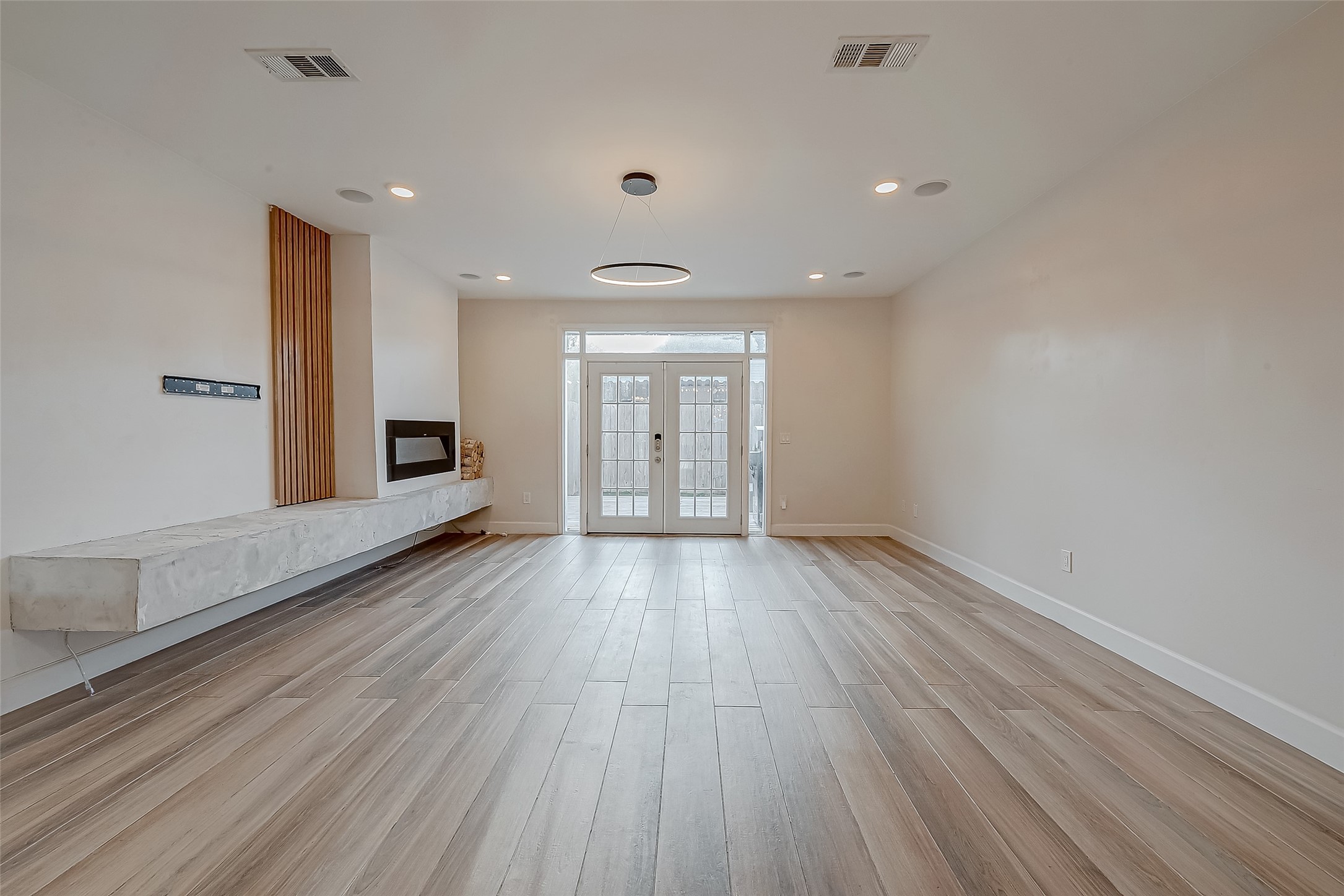 7497 Brompton Street, Unit 7497 Houston, TX 77025 - Photo 22 of 27 a view of gallery with wooden floor