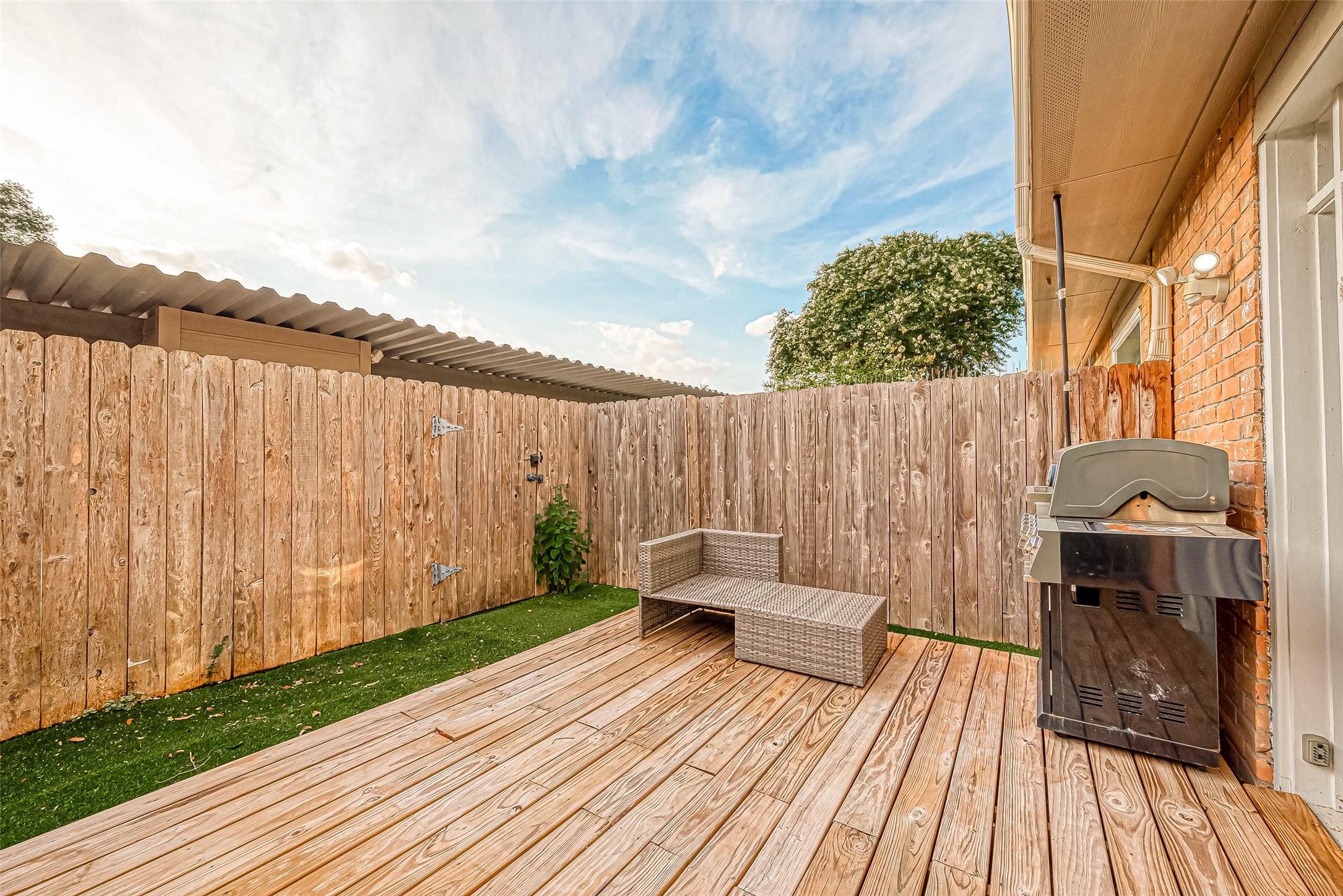 7497 Brompton Street, Unit 7497 Houston, TX 77025 - Photo 26 of 27 a view of outdoor space with seating area