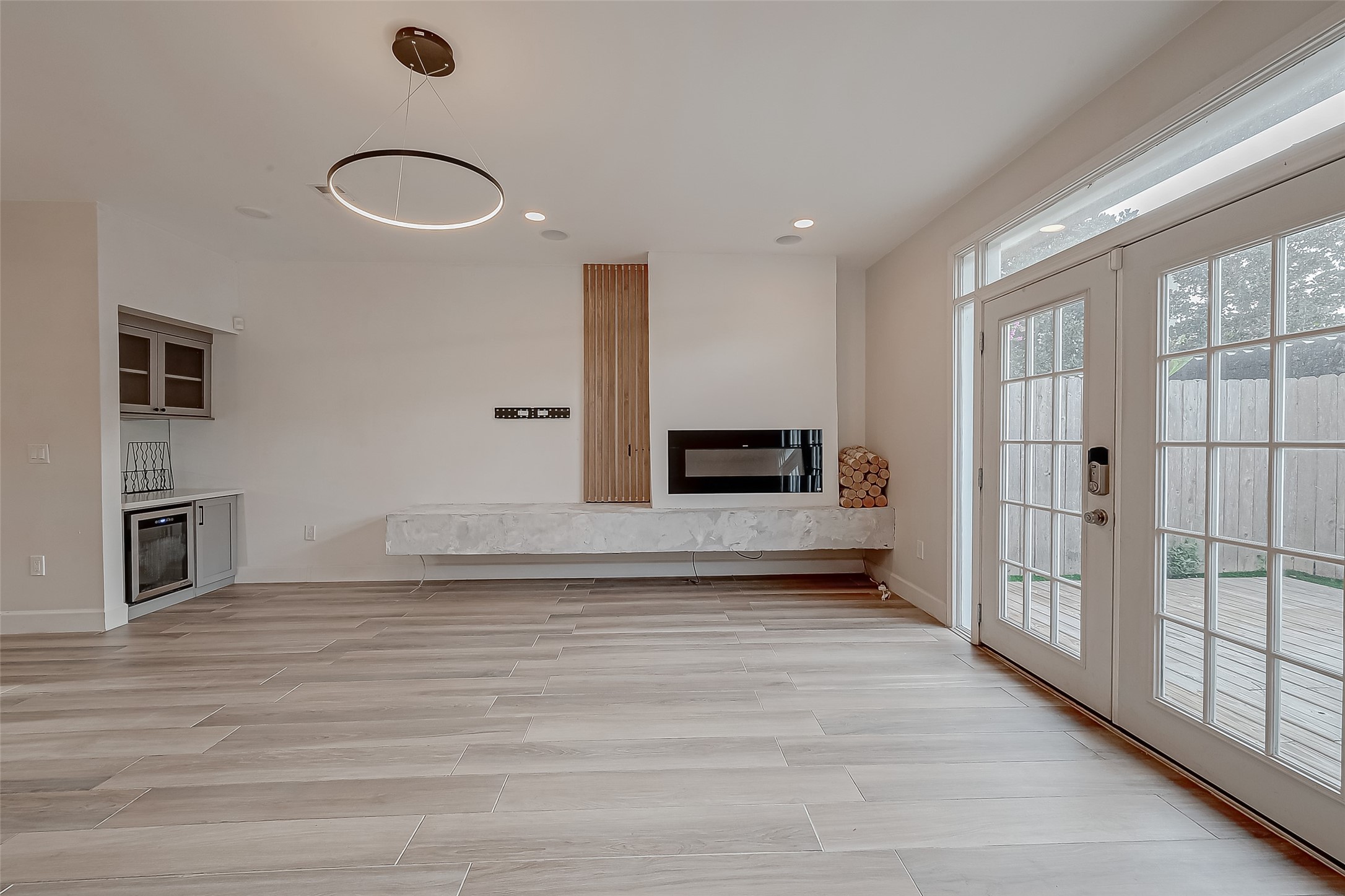 7497 Brompton Street, Unit 7497 Houston, TX 77025 - Photo 7 of 27 a view of a livingroom with a staircase