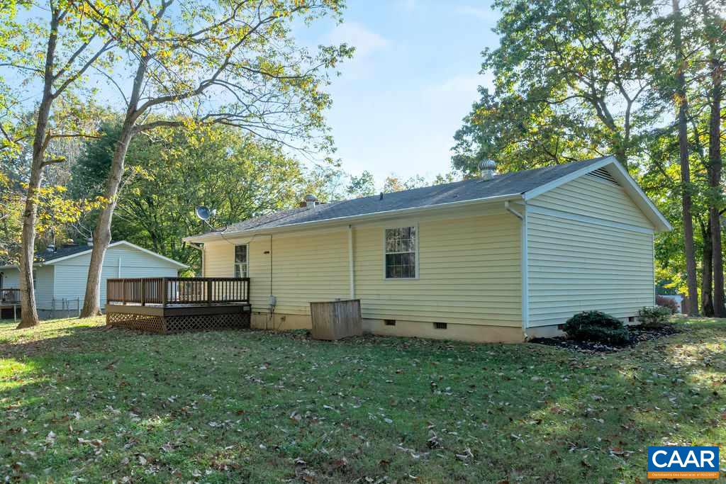 4546 Woods Edge Road Troy, VA 22974 - Photo 8 of 25 a view of a backyard with a garden
