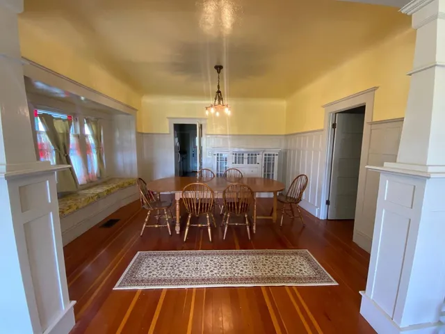 a view of a livingroom with furniture and window